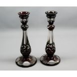 Pair of Bohemian type red and clear cut glass candlesticks, 10" high