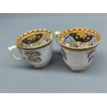 Mixed Lot: two 19th century English cups, the interiors decorated with gilt highlighted rural