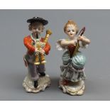 Pair of small 19th century Dresden porcelain models of a musical couple, 4" high