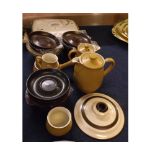 A collection of various Denby Wares including a Green Wheat covered dish, various plain ochre and