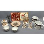 Mixed lot: four assorted small Staffordshire spill vases and model cottages, a 19th century plate