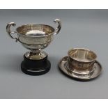 Mixed lot: silver wares comprising small double handled trophy cup with stand and a further silver