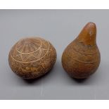 Two unusual decorated dried gourds, largest 3 ½” high