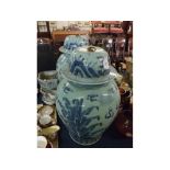 Pair of large 20th century Chinese blue and white covered jars, decorated with stylised dragons