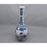 A Chinese large spill vase of baluster form, the lower body decorated in under glazed blue with