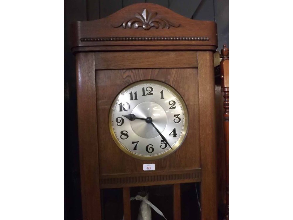 Early 20th century oak long case clock with glazed door and applied cast detail, 82" high