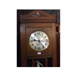 Early 20th century oak long case clock with glazed door and applied cast detail, 82" high