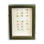 Framed set of fishing flies, the back with typed identification key, includes dry flies and wet