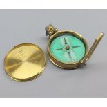 Brass cased Elliot Bros prismatic compass, 2 3/4" wide