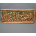 Classically decorated terracotta wall plaque, marked to reverse "Carl, Budde-Lund Eneret" and