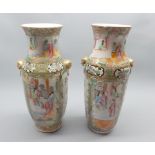 Pair of 19th century Chinese Canton vases, decorated with panels of various figures, birds,