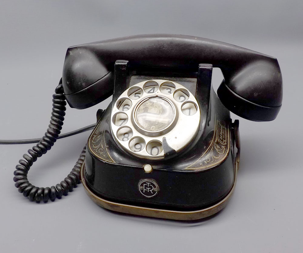 Vintage black Bakelite and brass mounted Belgian bell telephone, marked to base RTT56, approx 5"