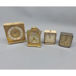 Collection of four Swiza bedside clocks