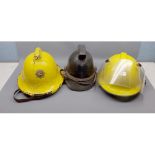 Mixed Lot: three assorted vintage fireman's helmets to include one example marked "Norfolk Fire
