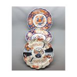 Three late 19th or early 20th century Japanese Imari plates with frilled rims, largest 14"