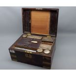19th century rosewood vanity box, with brass escutcheon and similar brass bound corners, central