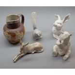 Mixed Lot: Lladro model donkey, Lladro warbler, Kaiser rabbit and a Kaiser bear, together with a