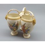 Unusual Royal Worcester floral decorated triple vase with looped handles (some damage apparent),