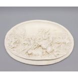 20th century oval plasterwork wall panel, depicting a battle scene, signed Justin, approx 14"