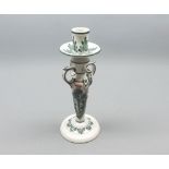 Wemyss Ware four-handled candlestick, decorated with thistle design, (chipped to top), 10" high