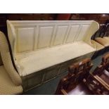 20th century painted pine settle with storage base and panelled back, 72" wide