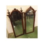 Pair of late 19th century dome topped narrow wall mirrors, with carved decoration to frames,