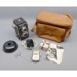 Vintage Delmonta cased camera, with instructions