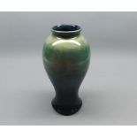 Moorcroft baluster vase, decorated in tones of turquoise, 9" high, impressed marks and signature