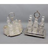 Two late 19th or early 20th century silver plated cruet stands, each with six clear glass bottles/