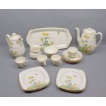 Royal Venton Ware, Marigold pattern coffee set comprising coffee pot, hot water jug, sugar basin,