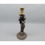 Carved hardwood and brass mounted candlestick in the form of a classically dressed lady, 12" high