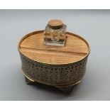 Small desk inkwell, with oval base metal surround, 5 1/2" diameter