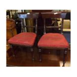 Pair of 19th century mahogany bar back children's chairs, raised on tapering legs, 26 1/2" high