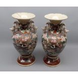 Pair of late 19th or early 20th century Japanese double-handled vases, decorated with various