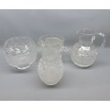 Mixed Lot: 20th century cut clear glass wares comprising a jug with looped handle, and three further