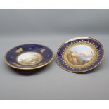 Two 19th century English circular plates, decorated with central scenes of castles (these are