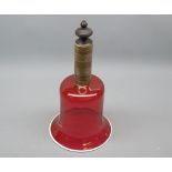 Cranberry glass hand bell with brass handle, (lacks clanger), 11" high