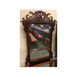 Mahogany Chippendale style large wall mirror, crested with a ho-ho bird with fret carved mounts