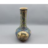 Iznik pottery baluster vase, decorated with various figures, floral detail etc, 10 high