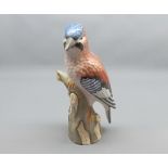 Large Continental model of a Jay on tree trunk base, (beak is repaired), 10 = high