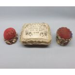 Pair of early 20th century pin cushions, applied with shell detail, and a further Valentine cushion,