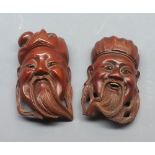Two oriental hardwood small masks, 5" long