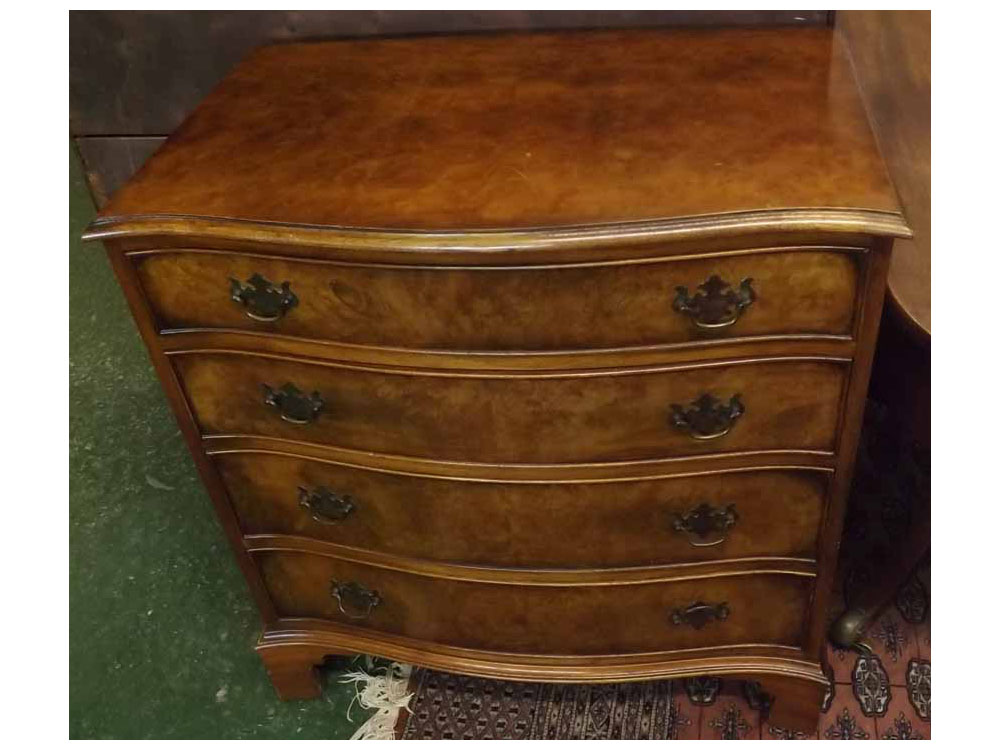 Reproduction walnut effect serpentine fronted four drawer chest, 31" wide