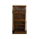 Light oak Globe Wernicke style bookcase, possibly Lebus, of five sections, 34" wide