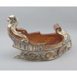 Brannam boat-shaped oval vase, decorated in shades of treacle etc (minor chips), 12" long