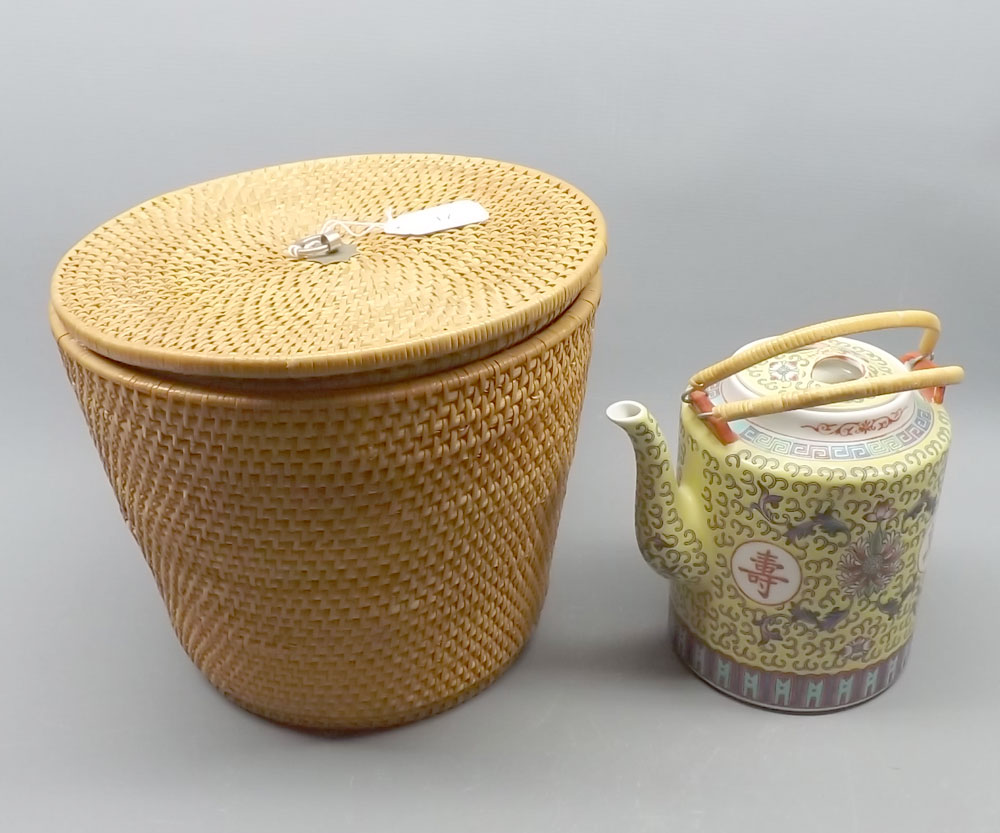 20th century oriental cylindrical teapot, in a wicker presentation case