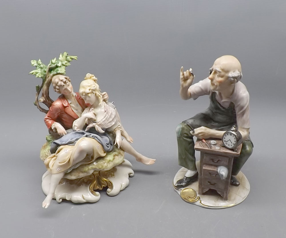 Capo di Monte figure of a clockmaker and further Naples group, (2) 8 1/2" and 8" high