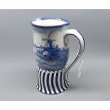 Doulton Burslem Norfolk jug, of waisted form, typically decorated in blue, 8 3/4" high