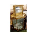 Giltwood framed and glass bijouterie/display cabinet, glazed cupboard top and open shelves below,