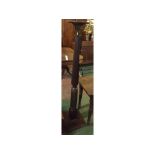 Mahogany torchere stand, 61" high